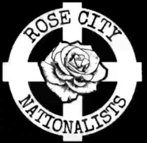 RCN logo: White celtic cross over a white background. There is a rose in the center, and text around the circle reads "Rose City Nationalists"